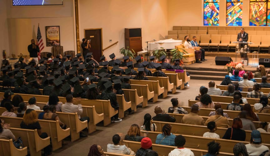 548 Foundation clean-energy workforce graduates celebrating at a Chicago graduation ceremony