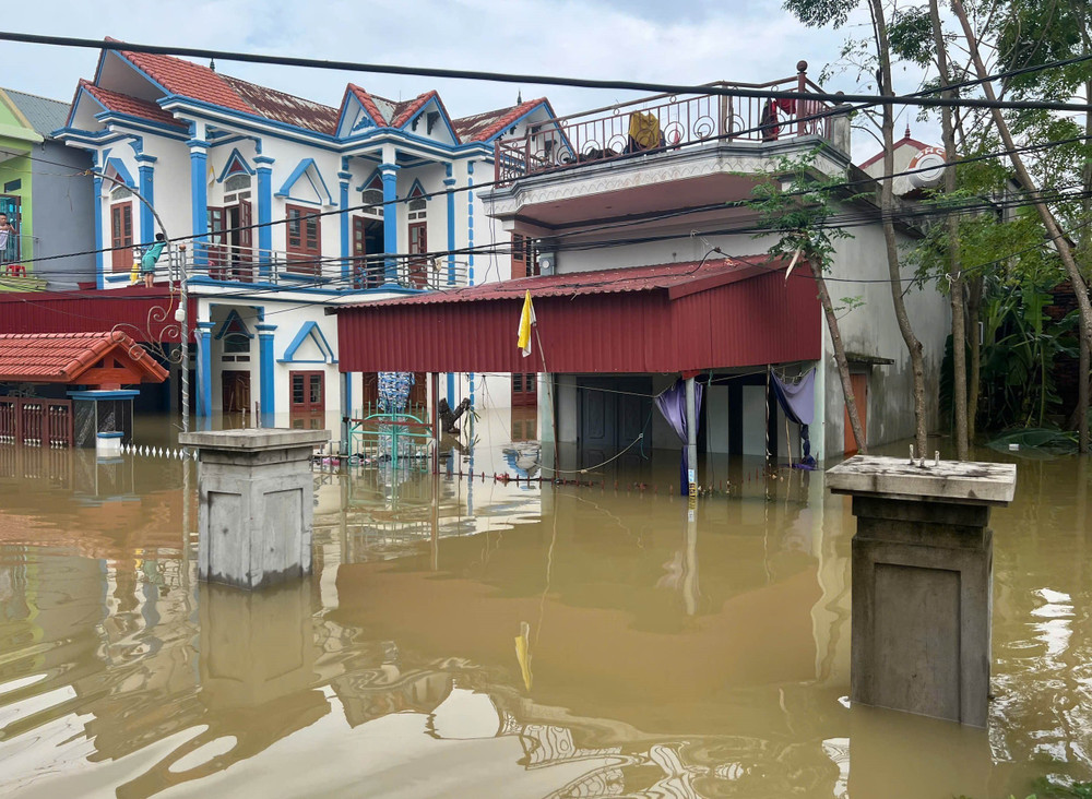 Floodwater surrounding homes in Nho Quan district, Ninh Binh, Vietnam, in September 2024